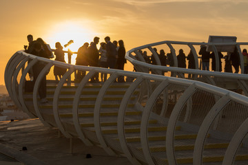 Tourist enjoying sunset in Seville