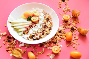  Healthy breakfast. Muesli with fruit.