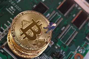 Golden Bitcoins. New virtual money. Studio shot