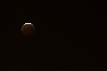 The Super Blood Wolf Moon eclipse of January 21, 2019 taken in Maastricht, the Netherlands at the vrijthof square. The moon only without people and buildings