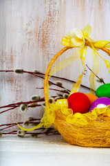  Easter eggs in a basket and willow.