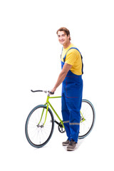 Obraz premium Man repairing his bike isolated on white background