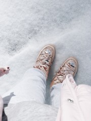 pink boots in the snow