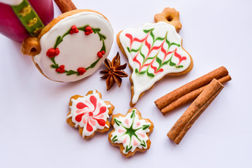 Fototapeta na wymiar Traditionally decorated Christmas ornament gingerbread cookies background
