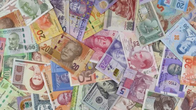 World currencies notes slow rotating. International money background. 4K stock video footage