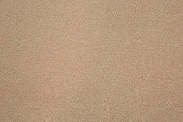 Fototapeta na wymiar Sand as background. Sandy beach.