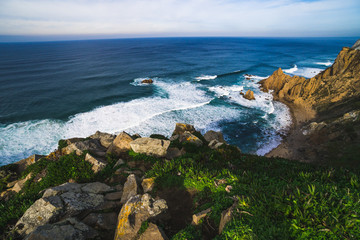 Beautiful ocean view of the Praia de Ursa, a wild place near touristic Cabo da Roca lighthouse, Portugal