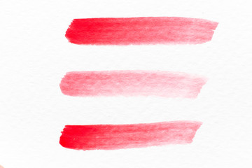 Red color watercolor handdrawing as line brush on white paper background