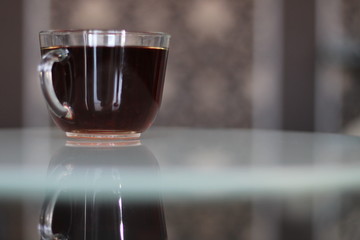 Cup of coffee on the table for Breakfast