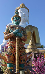 A Warrior and Buddha, Wat Phra That Doi Kham Temple, Chiang Mai, Thailand