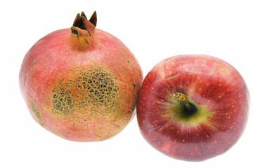 pomegranate and apple  isolated on white background