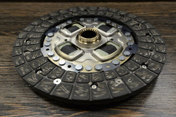 Clutch on wooden background