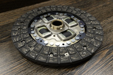 Clutch on wooden background