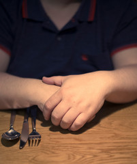 masculine hands on a table