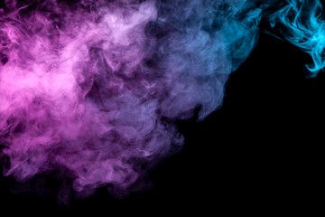 Translucent, thick smoke, illuminated by light against a dark background, divided into three colors: blue, green, pink and purple, burns out, evaporating from a steam of vape for print on t-shirt