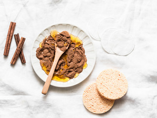 Cinnamon, honey face mask recipe on light background, top view. Beauty, health concept