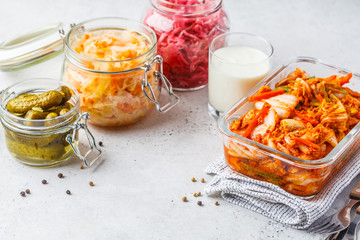 Probiotics food concept. Kimchi, beet sauerkraut, sauerkraut, kefir and pickled cucumbers.