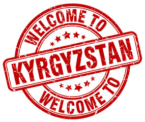welcome to Kyrgyzstan red round vintage stamp