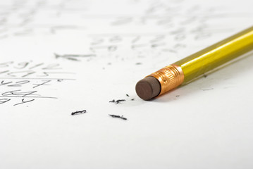 image of a pencil with rubber on a paper with inscription
