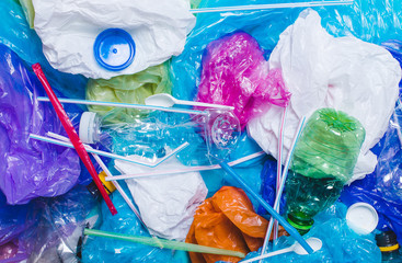Background of plastic bags used bottles. The concept of using environm