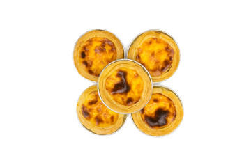 egg tart in aluminum foil cup isolated on white background