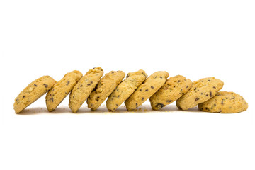 butter cookies with cashew nuts at eye level. isolated on white background