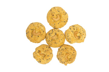 butter cookies with cashew nuts isolated on white background, top view