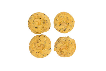 butter cookies with cashew nuts isolated on white background, top view