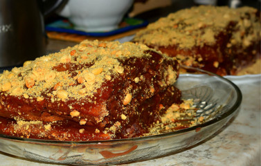 chocolate cake sprinkled with nuts