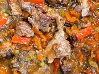 surface of cooked pottage from lamb and vegetables
