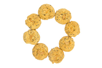 butter cookies with cashew nuts isolated on white background, top view