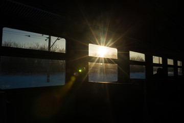 Windows in the train reminiscent of film, each window-a separate frame with its own story