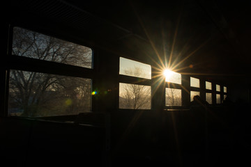 Windows in the train reminiscent of film, each window-a separate frame with its own story