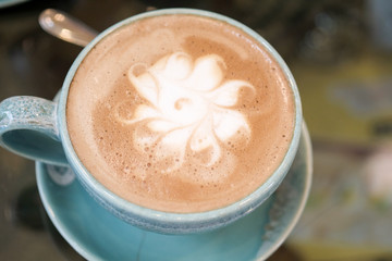 Hot coffee is placed on the table.