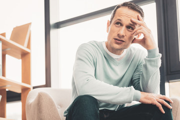 Irresponsible husband having depression after family conflict