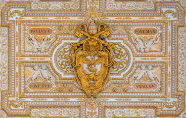 Paulus V coat of arms in the ceiling of the portico in Saint Peter Basilica in Rome, Italy.