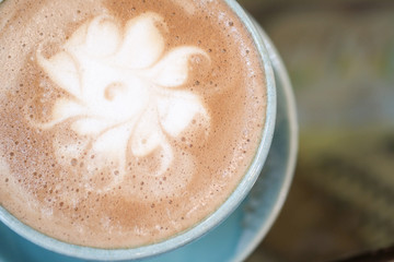 Hot coffee is placed on the table.