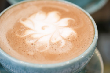 Hot coffee is placed on the table.
