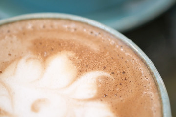 Hot coffee is placed on the table.