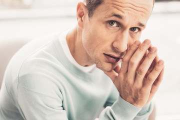 Mindful mature man having many thoughts