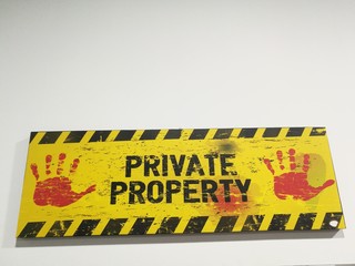 written private property on wood