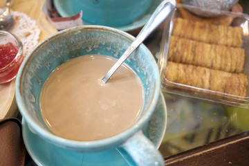 Hot coffee is placed on the table.