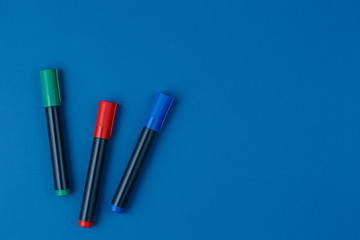 markers on the blue table top view