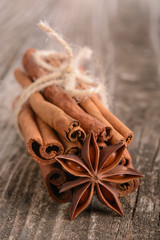 cinnamon sticks and anise, cinnamon sticks tied by rope