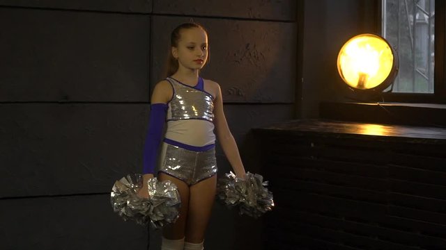 Little Cheerleader Preparing For Her Performance 