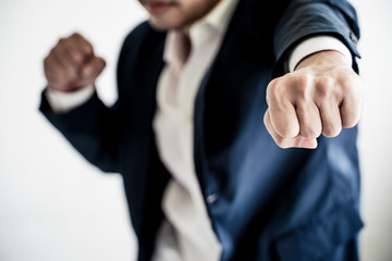 Business Fighting to success Concept. Businessman with fighting pose.