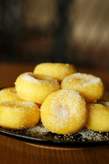 Fried donut with sugar, popular sweet  sold in market or restaurant, high calories, sugar and cholesterol level cause of many chronic disease such as diabetes and heart disease affect economic problem