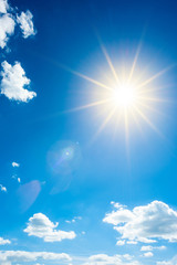 Summer background, wonderful blue sky with bright sun