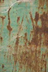 Grunge rusted metal background, green and brown