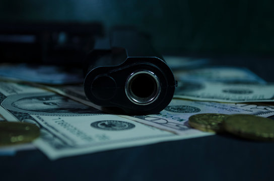 money, a gun and a knife - a crime for money